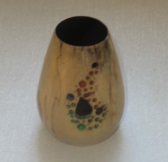 This small pierced vase won a highly commended certificate for Geoff Christie